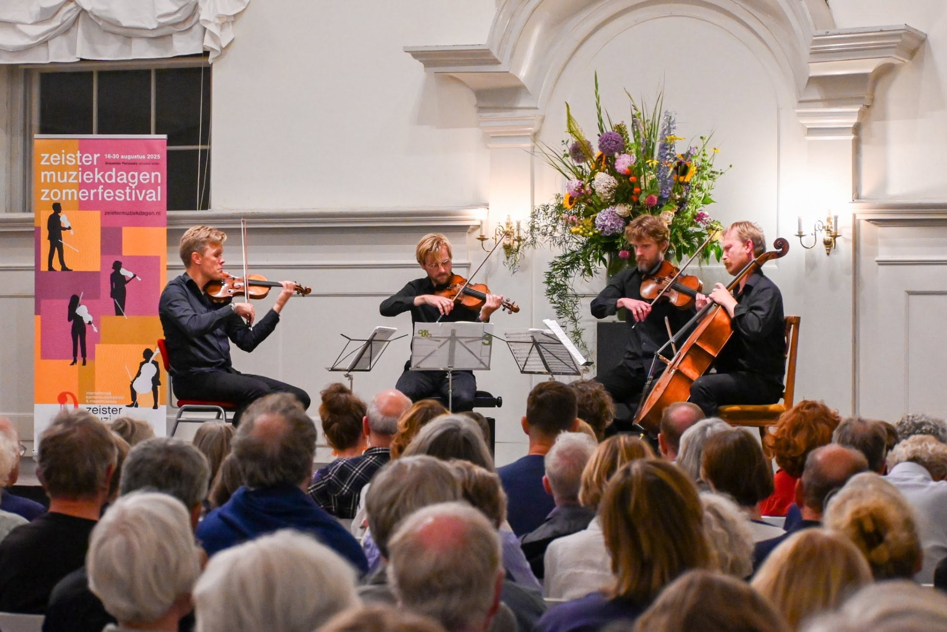 Strijkkwartet speelt voor een volle zaal tijdens de Zeister Muziekdagen